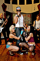 Aletta and Jenny fondle the singers dick